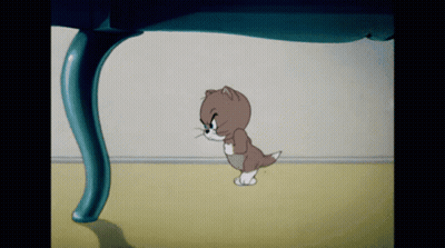 A Cartoon Cat Is Walking Under A Blue Table GIF
