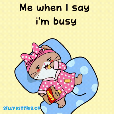 A Cartoon Cat Laying On A Pillow Eating Chips GIF