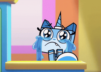 A Cartoon Cat With A Horn Is Crying With Tears Coming Out Of Its Eyes GIF