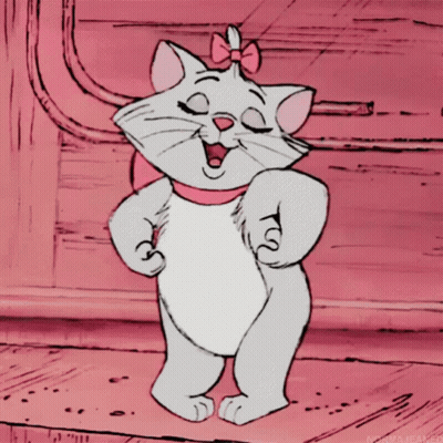 A Cartoon Cat With A Pink Bow On Her Head GIF