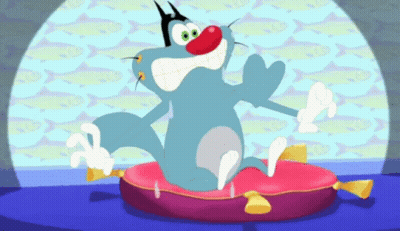 A Cartoon Cat With A Red Nose Is Sitting On A Cushion GIF