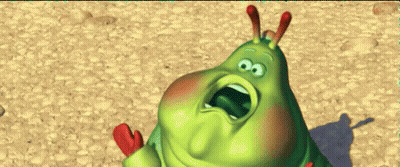 A Cartoon Caterpillar With Its Mouth Open And Red Ears GIF