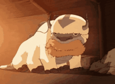 A Cartoon Character From Avatar The Last Airbender Is Sitting In The Dirt . GIF