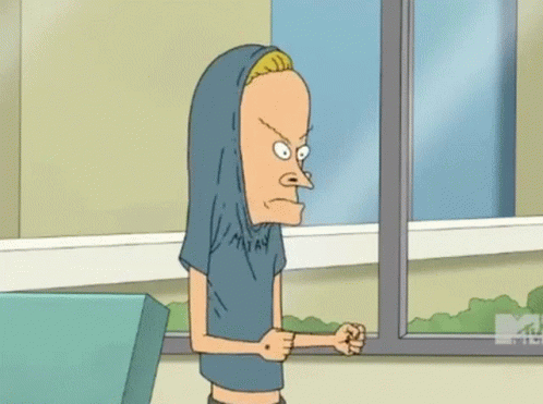 A Cartoon Character From Beavis And Butthead Is Standing In Front Of A Window With His Fist In His Hand . GIF