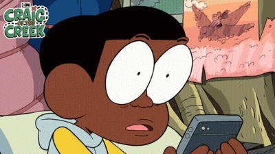 A Cartoon Character From Craig Of The Creek Looking At A Cell Phone GIF