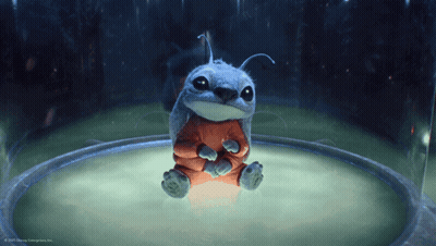 A Cartoon Character From Disney Enterprises Inc. Is Sitting In A Glass Container GIF
