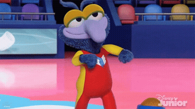 A Cartoon Character From Disney Junior Is Dancing On A Stage GIF