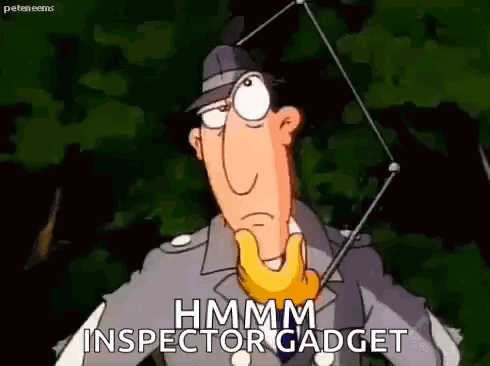 A Cartoon Character From Inspector Gadget Is Standing In Front Of A Tree And Talking . GIF