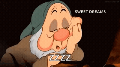 A Cartoon Character From Snow White And The Seven Dwarfs Is Sleeping . GIF