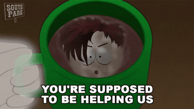 A Cartoon Character From South Park Is In A Green Mug Of Hot Chocolate GIF