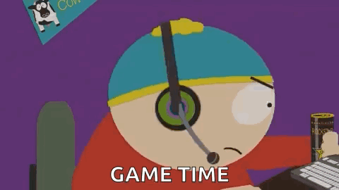 A Cartoon Character From South Park Is Sitting At A Desk Playing A Video Game With A Microphone . GIF