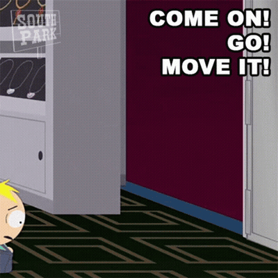 A Cartoon Character From South Park Is Standing In A Hallway . GIF