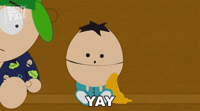 A Cartoon Character From South Park Sitting On A Table GIF