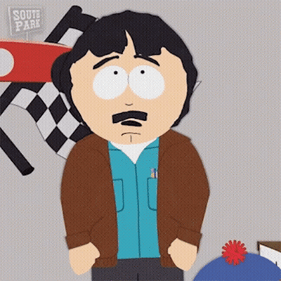 A Cartoon Character From South Park Stands In Front Of A Race Flag GIF