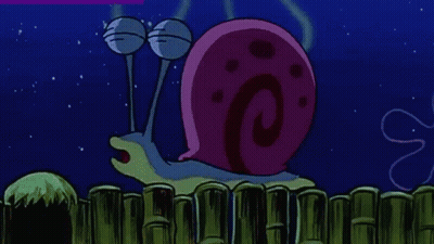 A Cartoon Character From Spongebob Squarepants Is Standing Next To A Purple Squidward . GIF