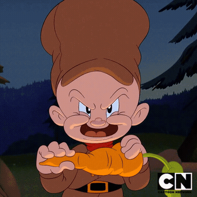 A Cartoon Character From The Cartoon Network Is Holding A Carrot GIF
