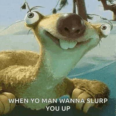 A Cartoon Character From The Movie Ice Age Is Smiling While Laying On The Ground . GIF