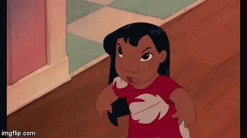 A Cartoon Character From The Movie Lilo And Stitch Is Standing In A Hallway . GIF