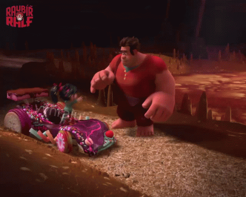 A Cartoon Character From The Movie Wreck It Ralph Is Kneeling Next To Another Character GIF