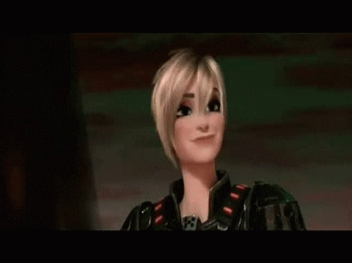 A Cartoon Character From The Movie Wreck It Ralph Is Smiling In Front Of A Rainbow Background . GIF