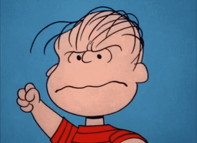 A Cartoon Character From The Peanuts Movie Is Making A Very Angry Face With His Fists In The Air . GIF