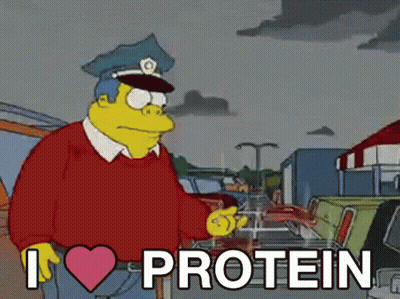 A Cartoon Character From The Simpsons Is Holding A Bottle Of Protein GIF