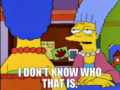 A Cartoon Character From The Simpsons Is Sitting Next To Another Cartoon Character . GIF