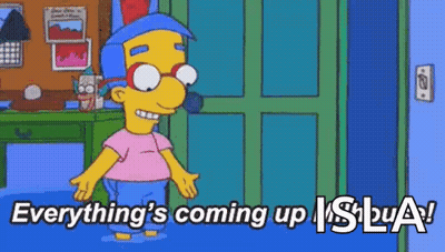 A Cartoon Character From The Simpsons Is Standing In Front Of A Door And Says `` Everything 'S Coming Up ! '' GIF