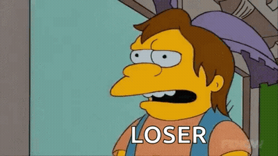 a cartoon character from the simpsons is standing in front of a window .