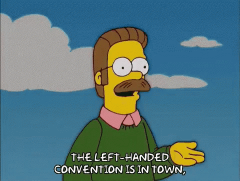 A Cartoon Character From The Simpsons Says " The Left Handed Convention Is In Town " GIF
