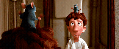 A Cartoon Character Has Two Mice On His Head GIF