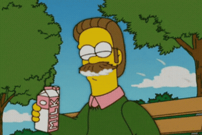 A Cartoon Character Holds A Carton Of Milk In His Hand GIF