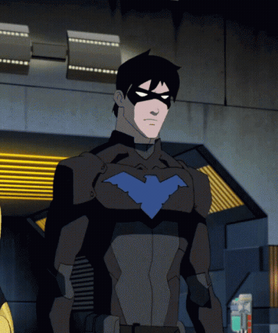 A Cartoon Character In A Batman Suit With A Blue Bird On His Chest GIF