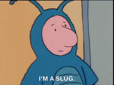 A Cartoon Character In A Blue Slug Costume Says `` I 'M A Slug '' . GIF