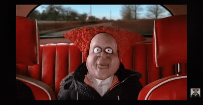 A Cartoon Character In A Car With A Red Hat On GIF