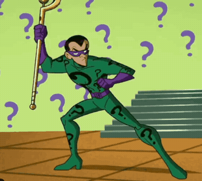 A Cartoon Character In A Green And Purple Costume Holds A Cane GIF