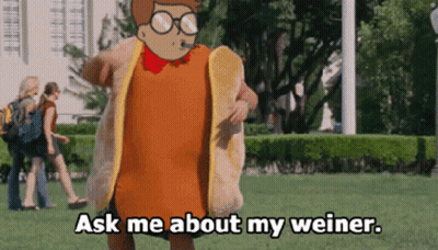 A Cartoon Character In A Hot Dog Costume Says Ask Me About My Weiner GIF