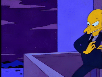 A Cartoon Character In A Suit And Tie Stands On A Balcony At Night GIF
