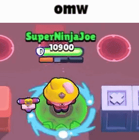 A Cartoon Character In A Yellow Hat Is Standing In A Green Circle In A Video Game . GIF