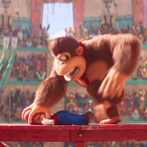 A Cartoon Character Is Being Attacked By A Monkey In Front Of A Crowd GIF