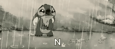 A Cartoon Character Is Crying In The Rain . GIF