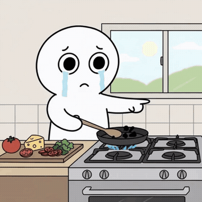 A Cartoon Character Is Crying While Cooking On A Stove Top GIF