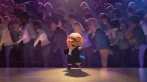 A Cartoon Character Is Dancing On A Stage In Front Of A Crowd . GIF