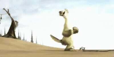 A Cartoon Character Is Doing A Handstand On A Sandy Hill . GIF