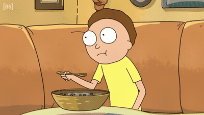A Cartoon Character Is Eating A Bowl Of Cereal With The Letters A And S On The Bottom Right GIF