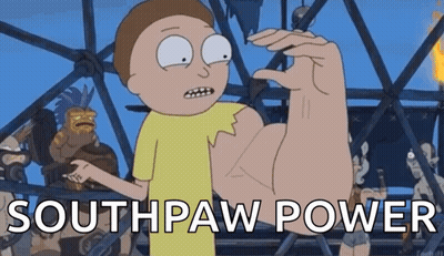 A Cartoon Character Is Flexing His Muscles And The Words Southpaw Power Are Visible Behind Him . GIF