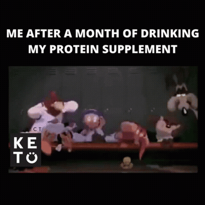 A Cartoon Character Is Flexing His Muscles With The Caption Me After A Month Of Drinking My Protein Supplement GIF