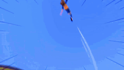 A Cartoon Character Is Flying Through The Air With A Fireball Coming Out Of His Chest GIF