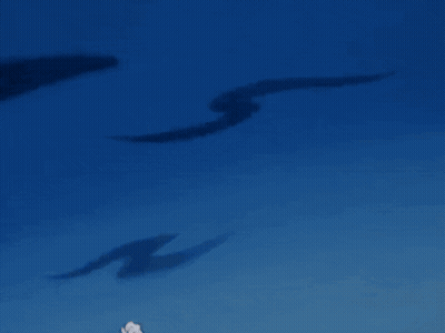 A Cartoon Character Is Flying Through The Air With A Fist In The Air GIF