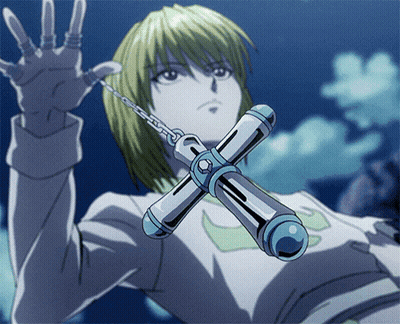 A Cartoon Character Is Holding A Cross With Chains Around It GIF